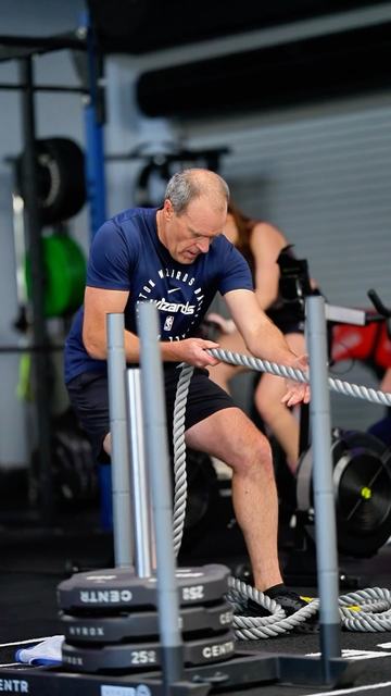 Sled pull on the Cave gym floor